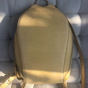 Louis Vuitton vintage backpack in pale yellow